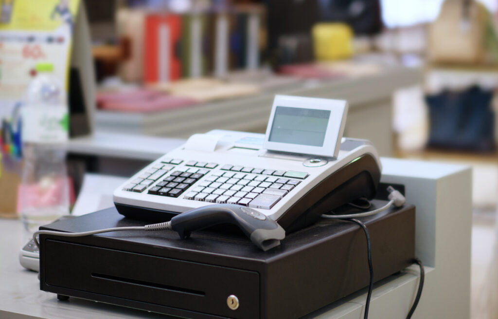 One cash register with a bar code reader